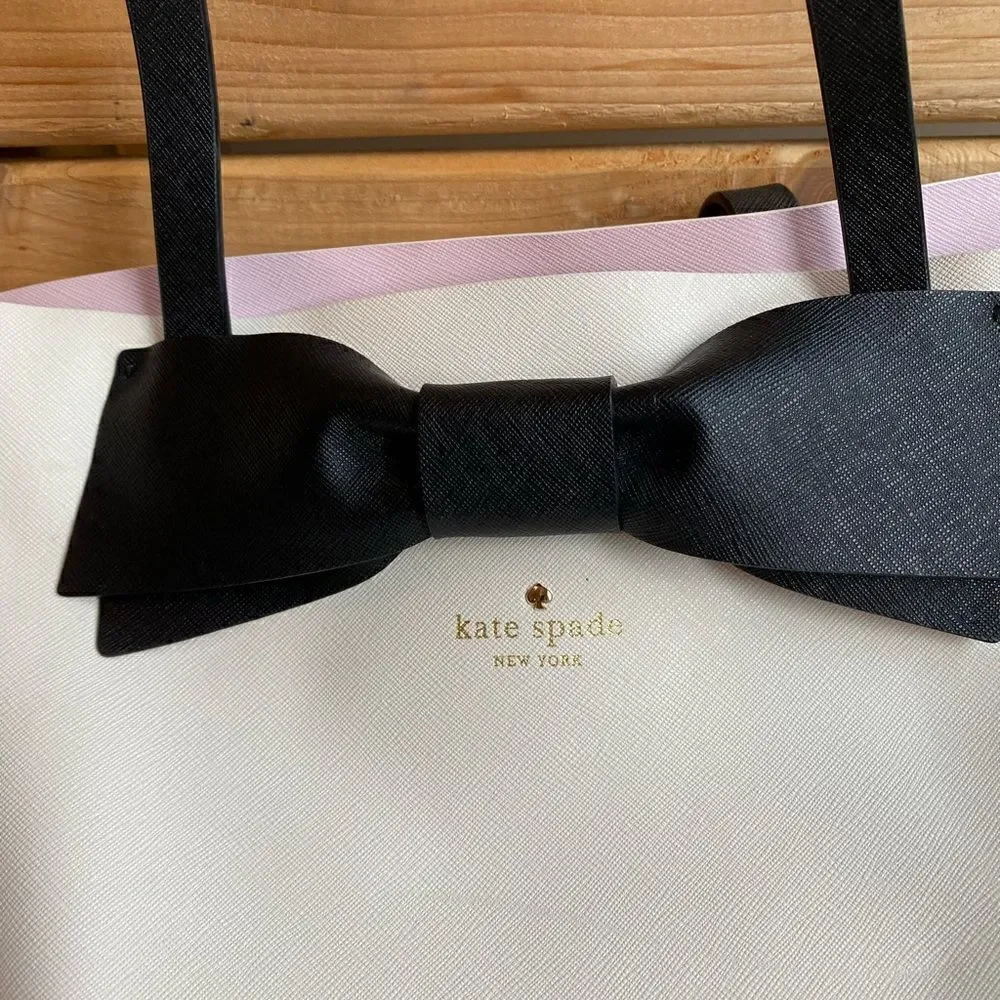 Kate  Spade  Purse with Bow color bag is Black and White